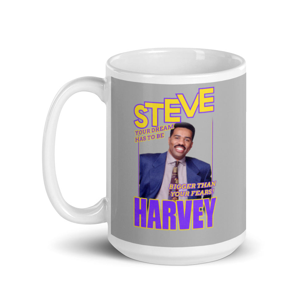 
                  
                    Load image into Gallery viewer, 11 oz White Coffee Mug with Steve in yellow text with purple outline and Harvey in purple and yellow outline a vintage image of Steve Harvey smiling with the words Your Dream Has To Be in purple with yellow outline and Bigger than your fears in yellow with purple outline on a grey background
                  
                