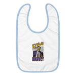 White Baby Bib and blue trim with Steve Harvey image and Steve in Yellow with Purple outline and Harvey in purple with yellow outline and "Your Dream Has to Be Bigger Than Your Fears"