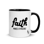 White 11 oz coffee mug black interior and handle with Faith Makes It Possible in black