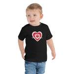 Male child modeling Black Toddler T-Shirt Layered heart with Chief Love Officer in white cursive text