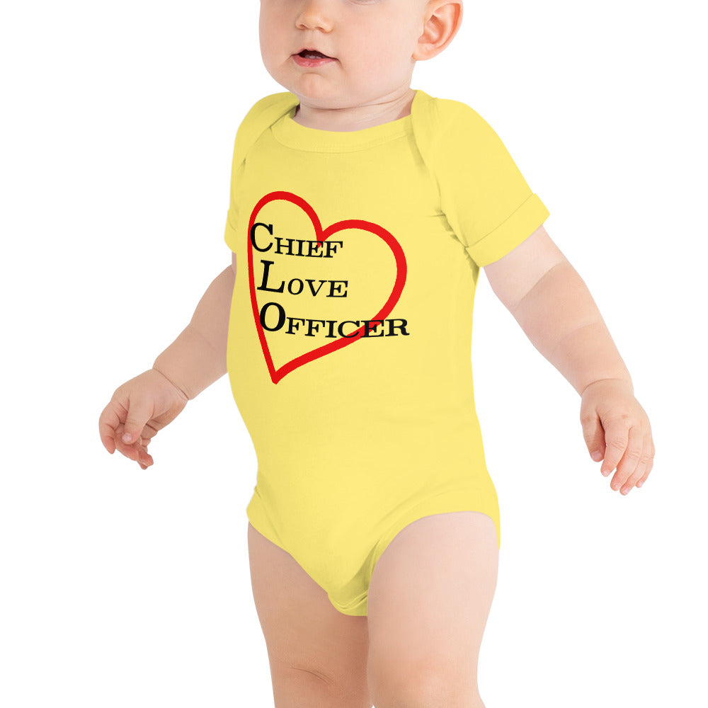 
                  
                    Load image into Gallery viewer, Yellow Baby Onesie Chief Love Officer with Heart outline in background
                  
                