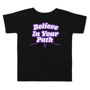 
                  
                    Load image into Gallery viewer, Black Toddler T-Shirt with Believe In Your Path written in white with purple outline and road graphic at the bottom
                  
                