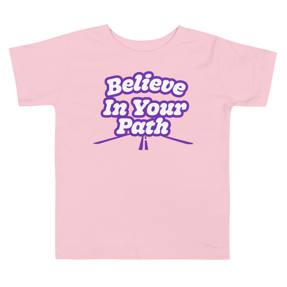 
                  
                    Load image into Gallery viewer, Pink Toddler T-Shirt with Believe In Your Path written in white with purple outline and road graphic at the bottom
                  
                