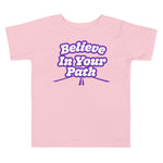 Pink Toddler T-Shirt with Believe In Your Path written in white with purple outline and road graphic at the bottom