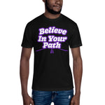 Male modeling Black Short Sleeve T-Shirt with Believe In Your Path text in white outlined in purple with road graphic at the bottom
