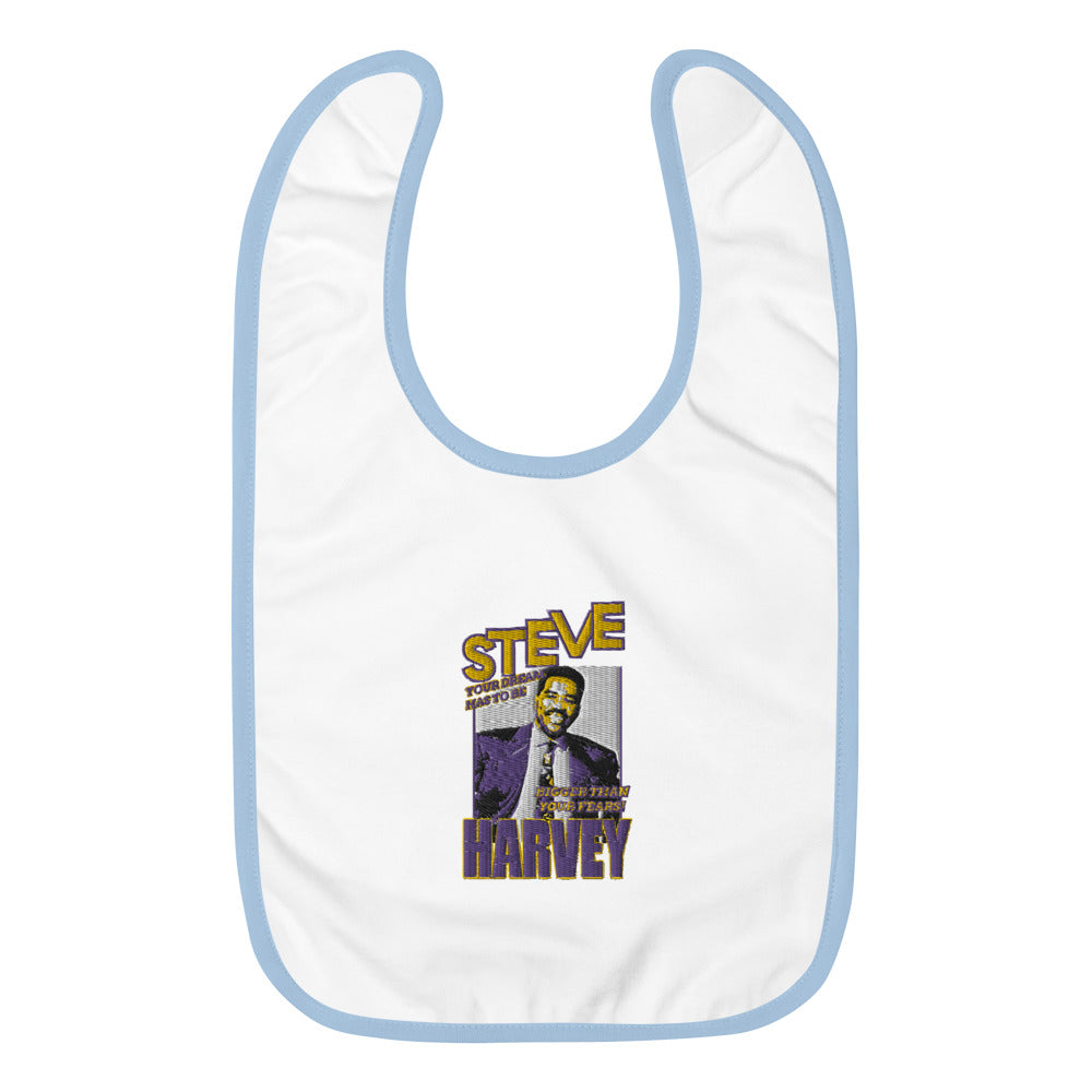 
                  
                    Load image into Gallery viewer, White Baby Bib and blue trim with Steve Harvey image and Steve in Yellow with Purple outline and Harvey in purple with yellow outline and &amp;quot;Your Dream Has to Be Bigger Than Your Fears&amp;quot;
                  
                