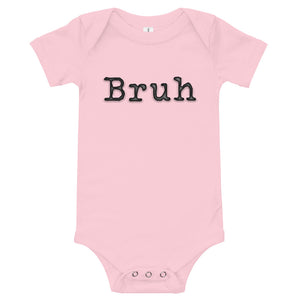 
                  
                    Load image into Gallery viewer, Pink shortsleeve baby onesie with Bruh in black typewriter text
                  
                