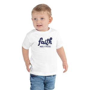 
                  
                    Load image into Gallery viewer, Toddler Modeling White T-Shirt Faith Makes It Possible in blue
                  
                