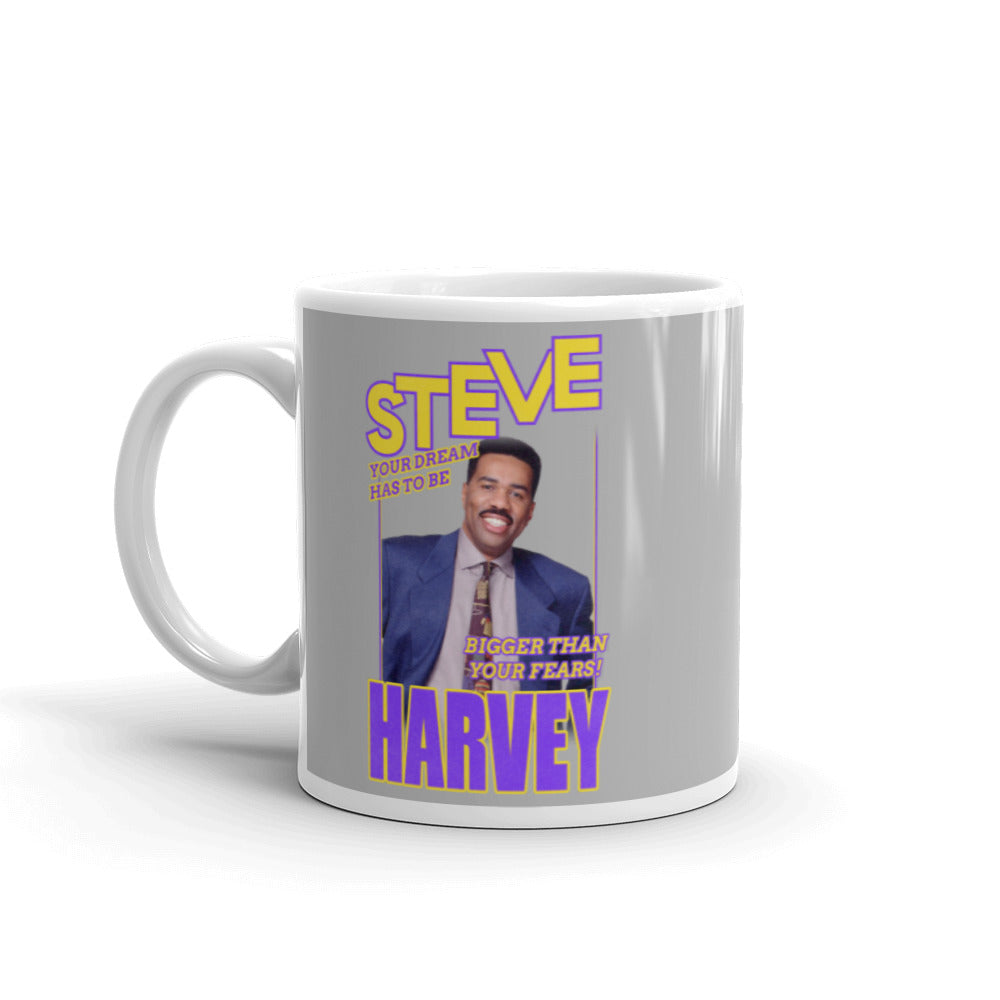 11 oz White Coffee Mug with Steve in yellow text with purple outline and Harvey in purple and yellow outline a vintage image of Steve Harvey smiling with the words Your Dream Has To Be in purple with yellow outline and Bigger than your fears in yellow with purple outline on a grey background