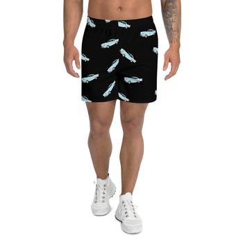 Male modeling black shorts with classic car graphic on them