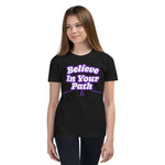 Youth Female modeling Youth Black T-Shirt with Believe In Your Path in white text with purple outline with road graphic