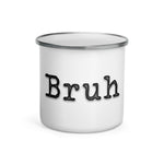 White mug with siver lip and "Bruh" text in black typewriter font